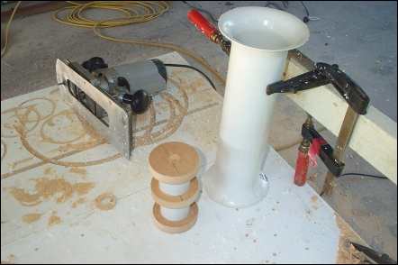 Photo of a simple jig for using a router on PVC pipe